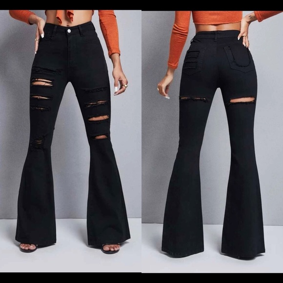 SOLD- Ripped flare leg jeans - Picture 1 of 2